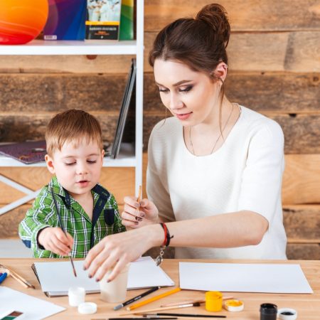 beautiful-mother-and-her-little-son-painting-in-art-school.jpg